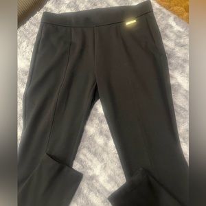 Michael Kors Black pull on pants. Dress up or down. Size M.